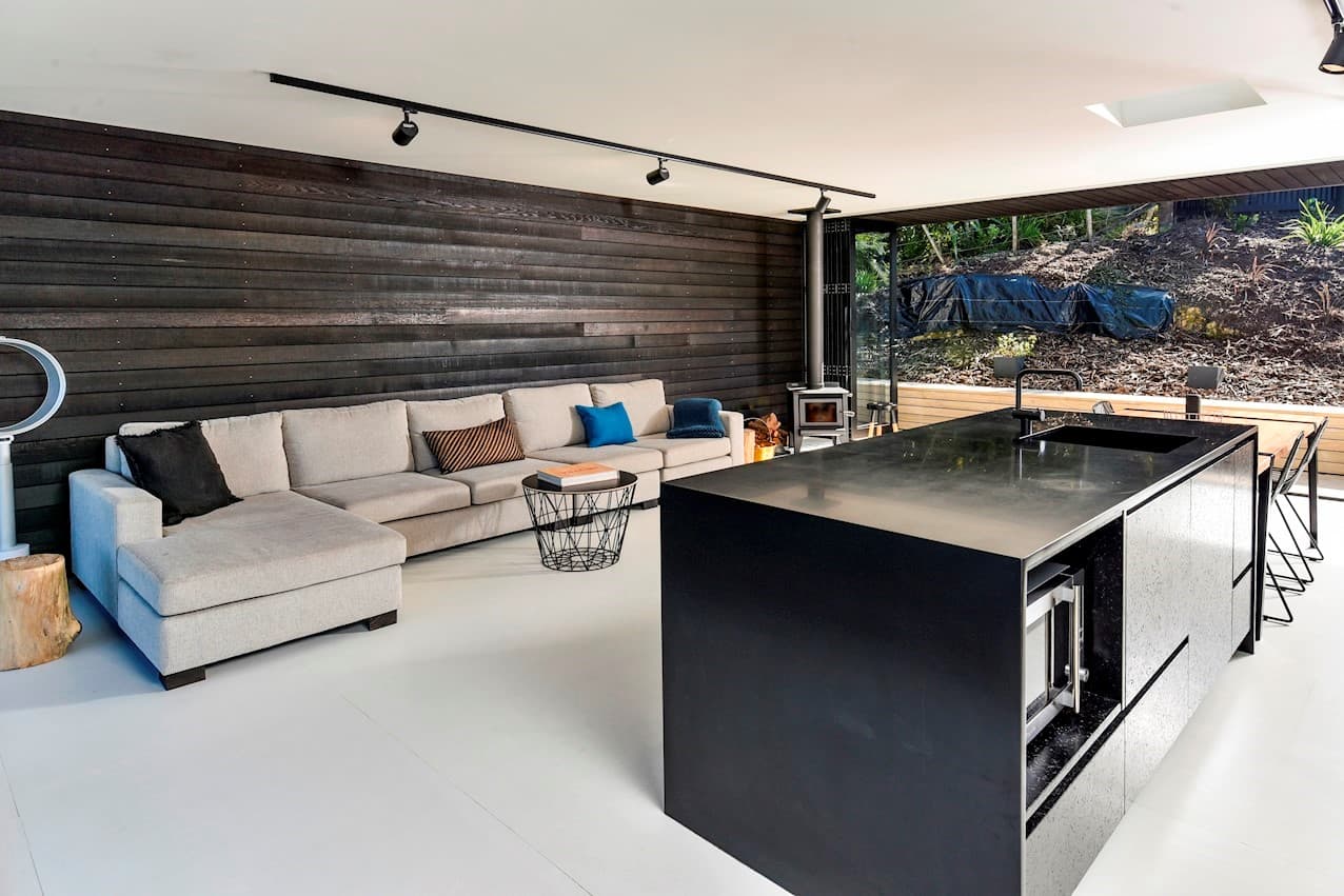 Living and kitchen in dark cedar