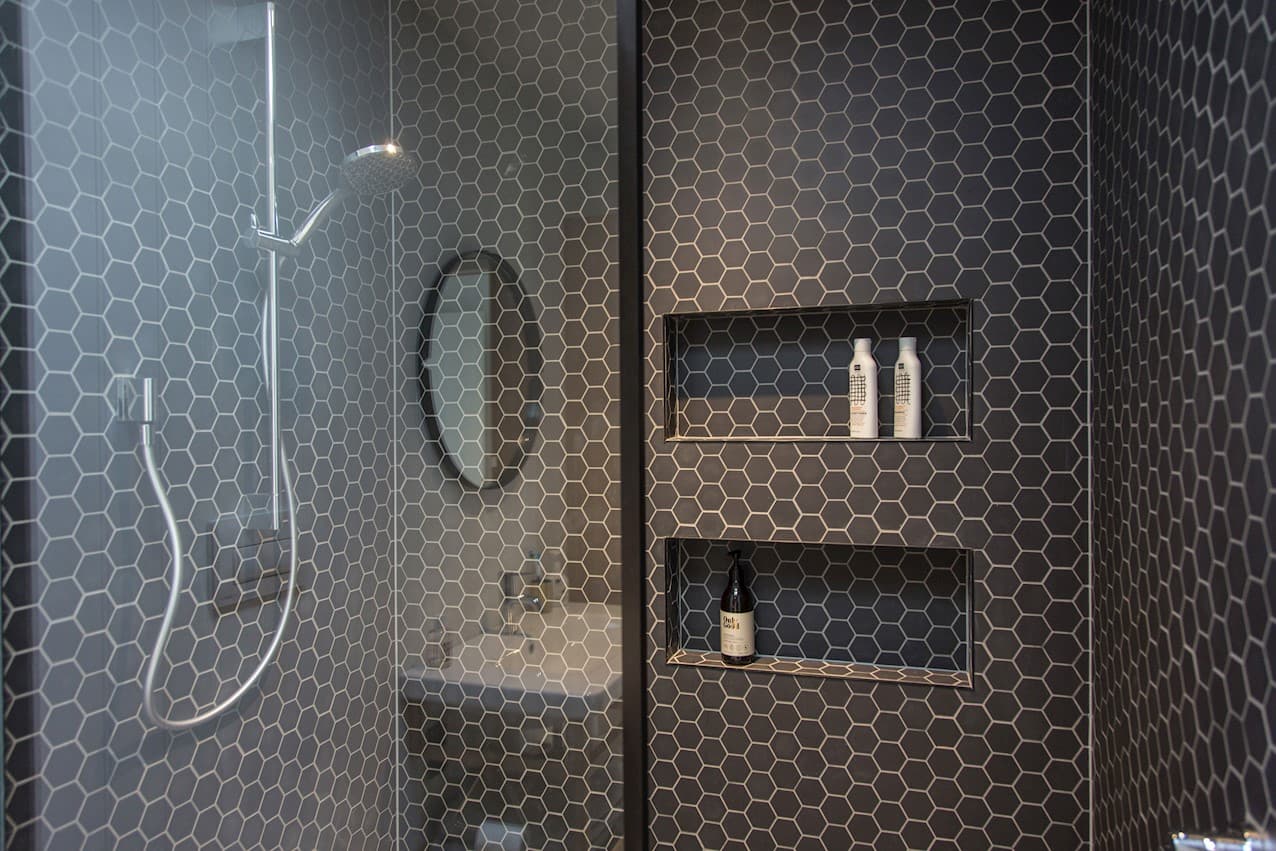 The tiled shower in black
