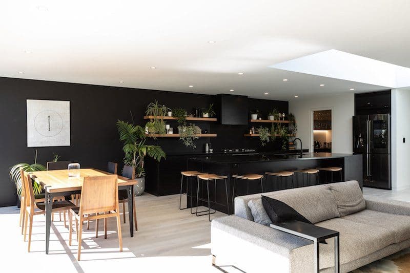 Dining, kitchen behind