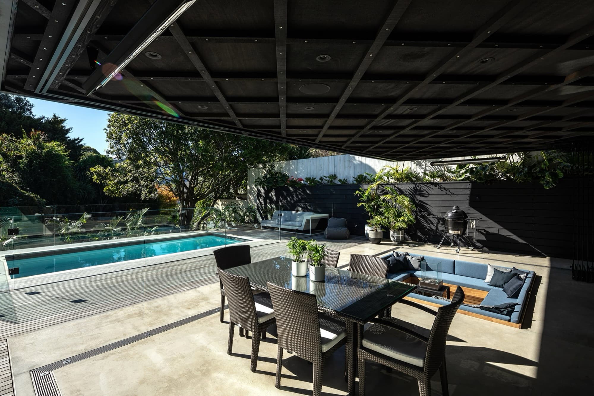 Cantilevered glass box over the pool