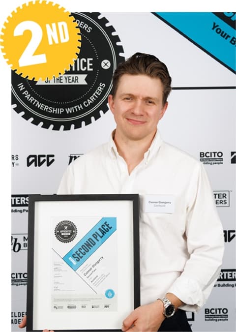 Connor Glengarry with his second place certificate at the Registered Master Builders Apprentice of the Year, Auckland