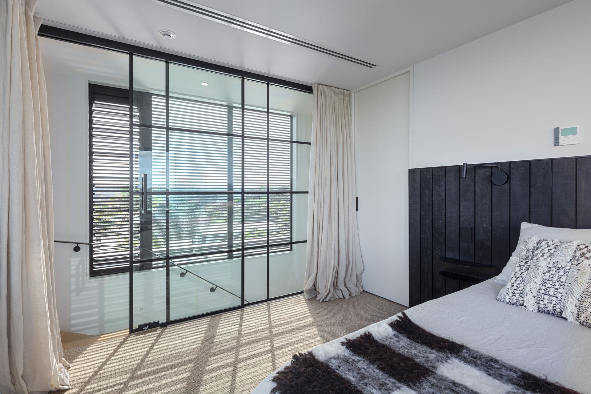 Bedroom behind the glazed partition